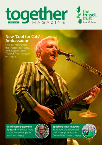 Front cover of July 2024 edition of Together Magazine, featuring Glenn Tilbrook from Squeeze pictured singing and playing a guitar.